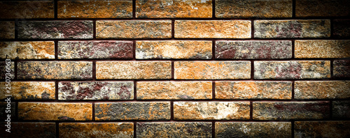 Multi-color old and grunge brick wall. Vintage background.