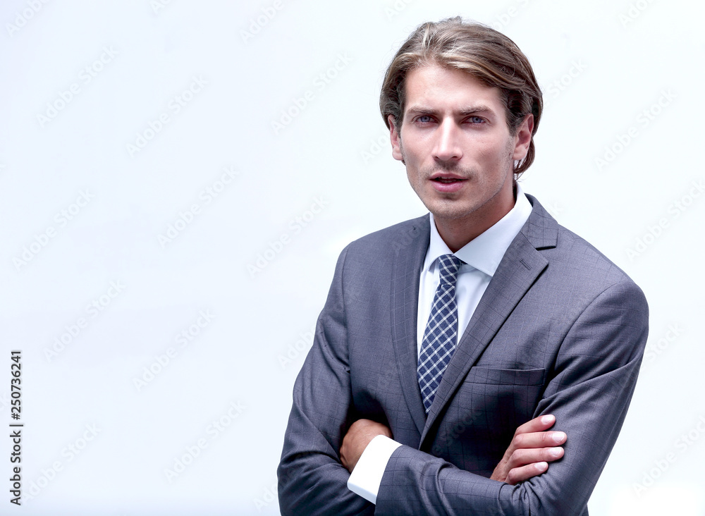 thoughtful businessman adjusting his tie. thoughtful businessman adjusting his tie.