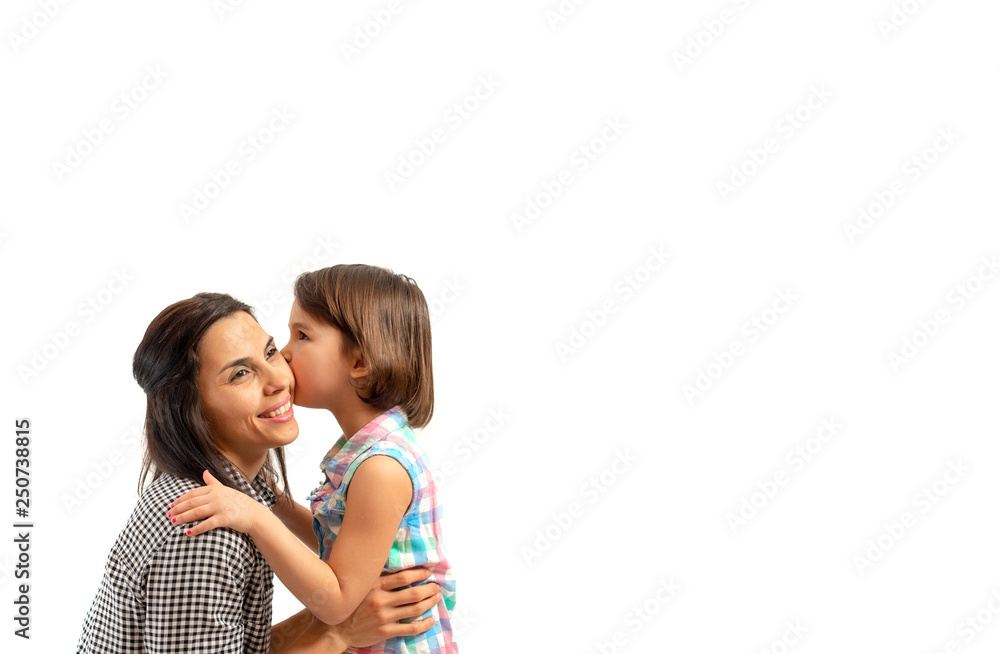 Portrait of happy daughter kissing her mother, isolated on white background Portrait of happy daughter kissing her mother, isolated on white background