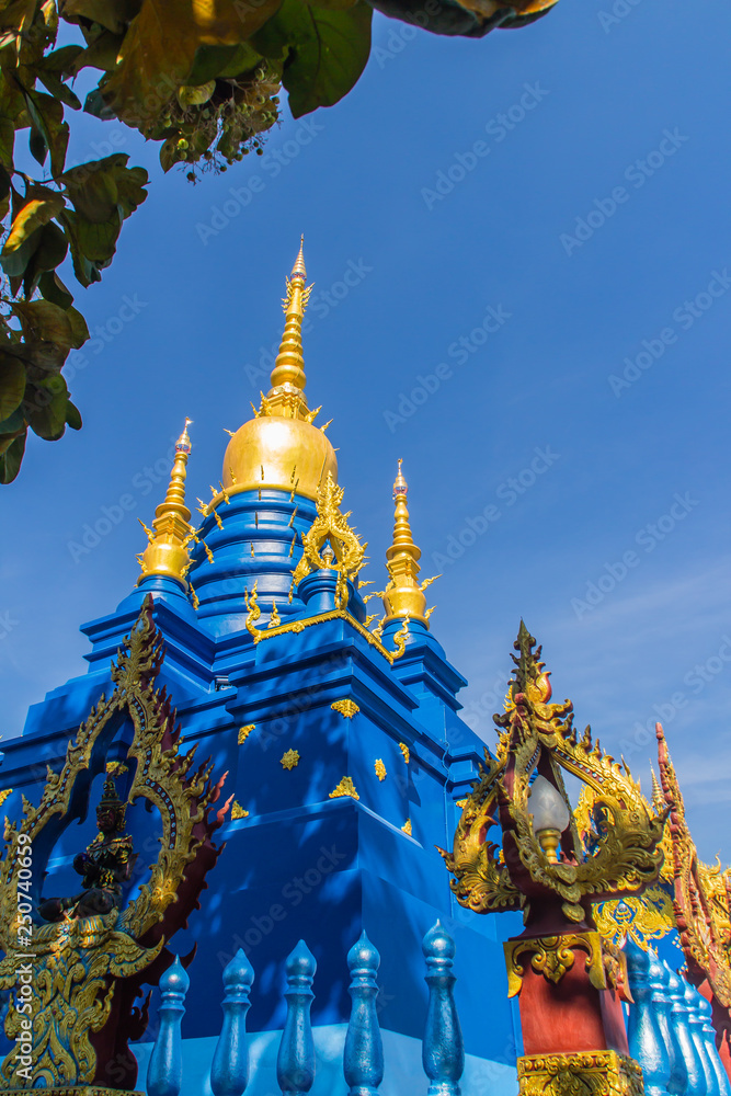 Fototapeta premium Beautiful blue pagoda at Wat Rong Suea Ten Temple, also known as the Blue Temple. Wat Rong Suea Ten or the Tiger Temple is locate at Chiang Rai province, northern part of Thailand.