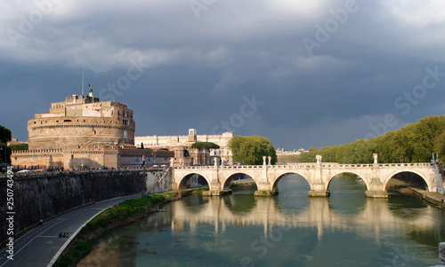  Sant` Angelo Castle and Tiber River in Rome, Italy . The Mausoleum of Hadrian, usually known as Castel Sant Angelo is a towering cylindrical building in Parco Adriano, Rome, Italy. 