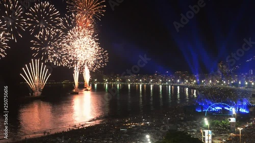 Revelers, both locals and tourist, enjoy the breath-taking New Years fireworks display along Copacabana Beach, Rio de Janeiro, Brazil