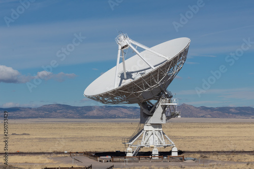 Very Large Array radio astronomy observatory dish, engineering science technology, blue sky, horizontal aspect