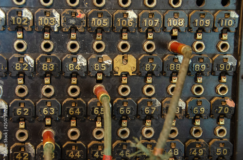 close up of vintage manual telephone switchboard with cable
