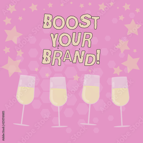 Text sign showing Boost Your Brand. Conceptual photo describe high levels of overall customer satisfaction Filled Cocktail Wine Glasses with Scattered Stars as Confetti Stemware