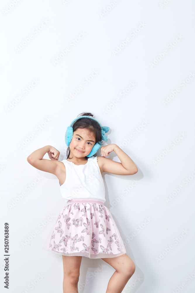 girl in winter earmuffs Smile happy girl in winter earmuffs Smile happy