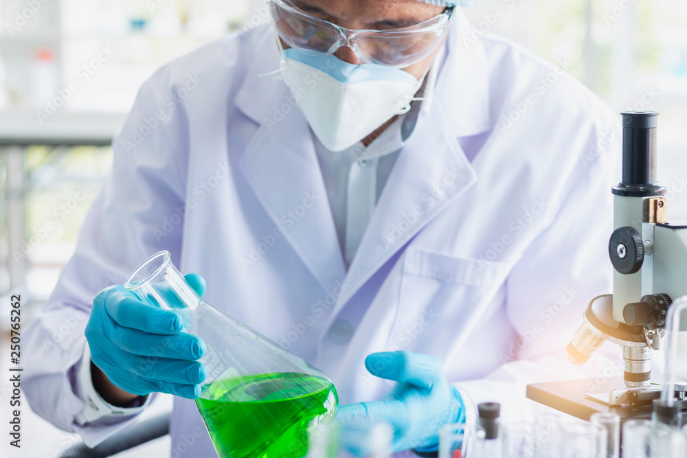 Fototapeta premium Scientists are doing research in science laboratories and microscopes are working devices.