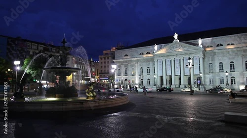 WS Fountain in front of National Theatre D. Maria II illuminated at night/ Lisbon, Portugal photo