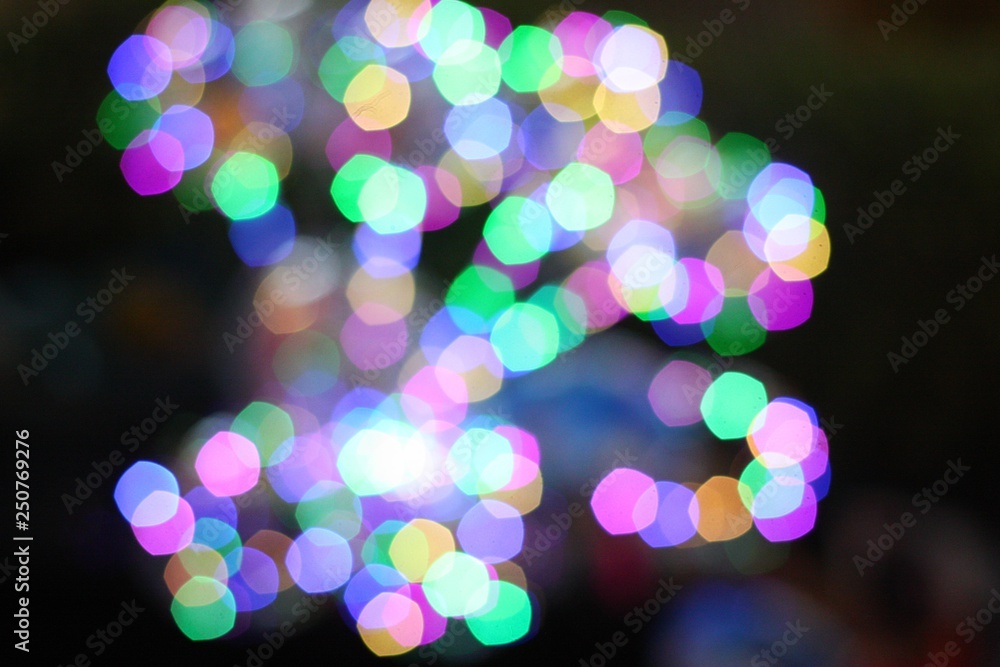 Beautiful bokeh of night decoration during Christmas time in the city.