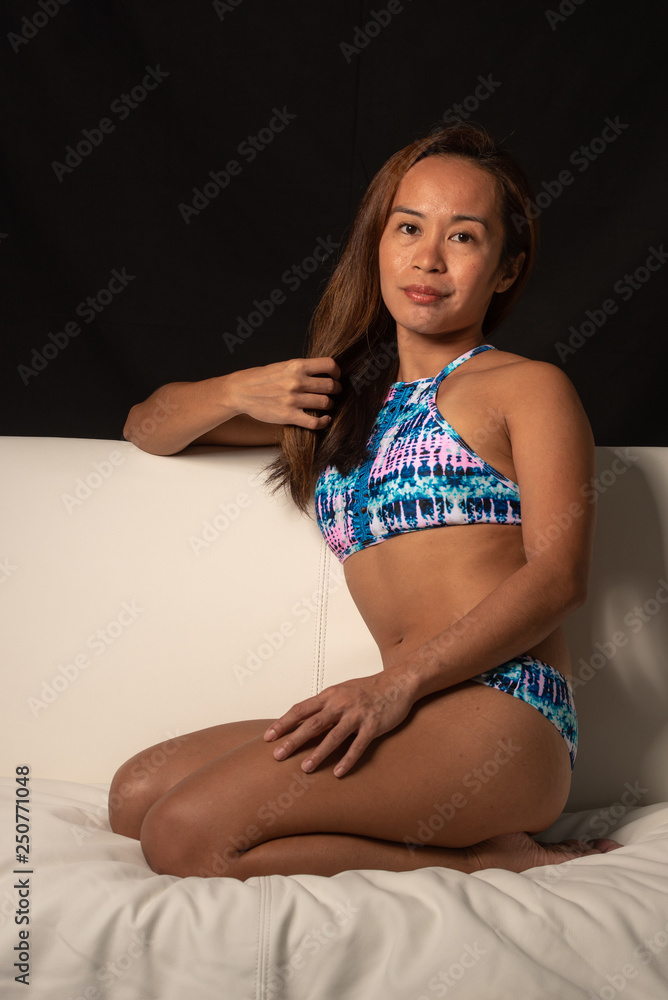 Filipino girl posing in bikini Stock Photo | Adobe Stock