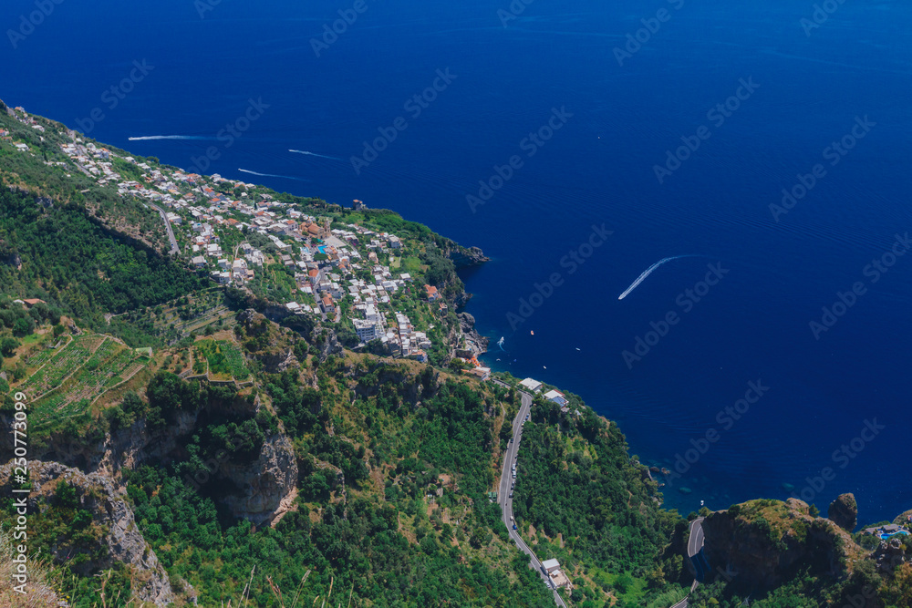 Town by sea and coastline of Amalfi Coast from Path of the Gods, near Positano, Italy