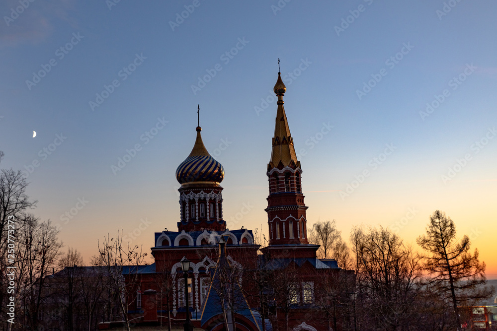 Church on the background of a beautiful sunset. Easter holiday for Christians Church on the background of a beautiful sunset. Easter holiday for Christians