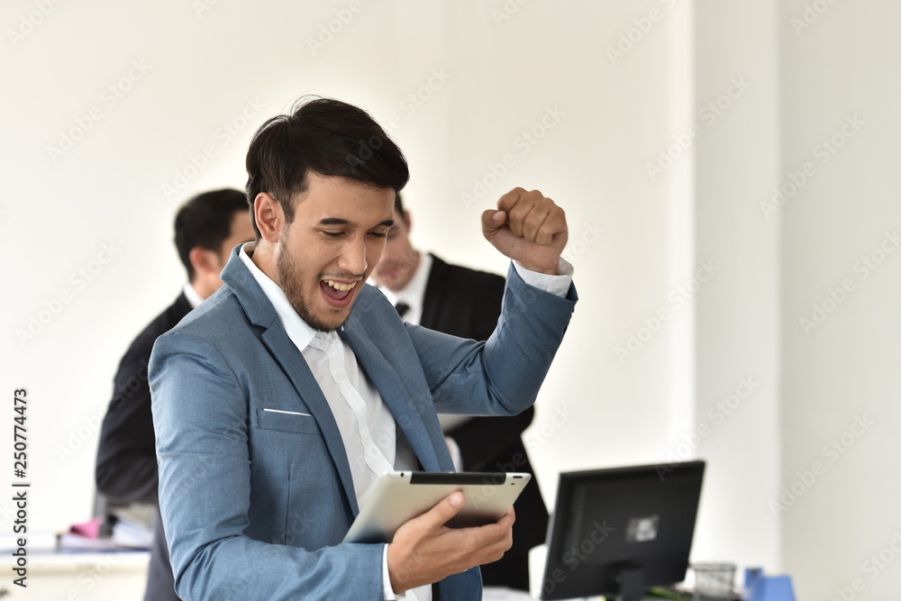 A group of young businessmen are having fun and chatting. And sometimes stressful A group of young businessmen are having fun and chatting. And sometimes stressful