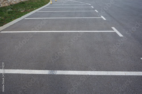 Parking spaces on the parking lot © Nana_studio