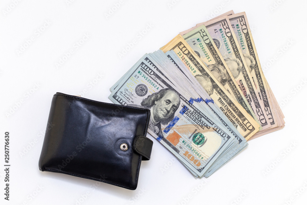Black wallet, hundred dollar bills on white background with copy space. finance and money background. American Dollars Cash Money. fifty Bucks. Black wallet, hundred dollar bills on white background with copy space. finance and money background. American Dollars Cash Money. fifty Bucks.