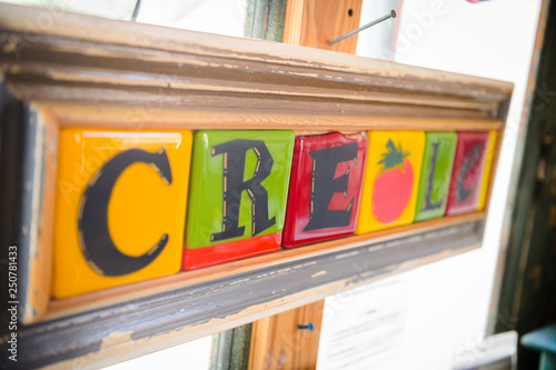 A block letter sign saying creole in New Orleans photo