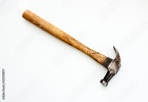 Vintage and old hammer wood handle and steel head on white background 