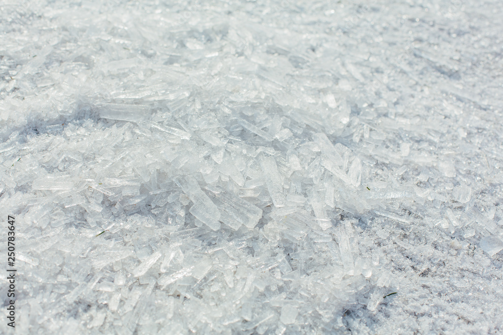 Amazing abstract broken ice crystals texture. Clear melting ice background.