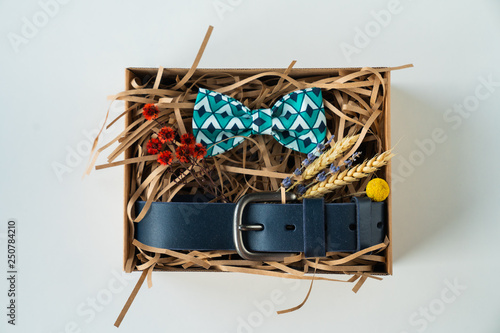 wrapped gift  bow tie and belt  gift for man