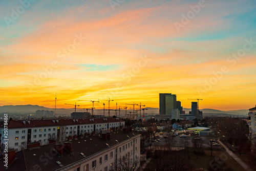 Sunset over a construction site with 16 cranes in the south of Vienna © Marktl Robert