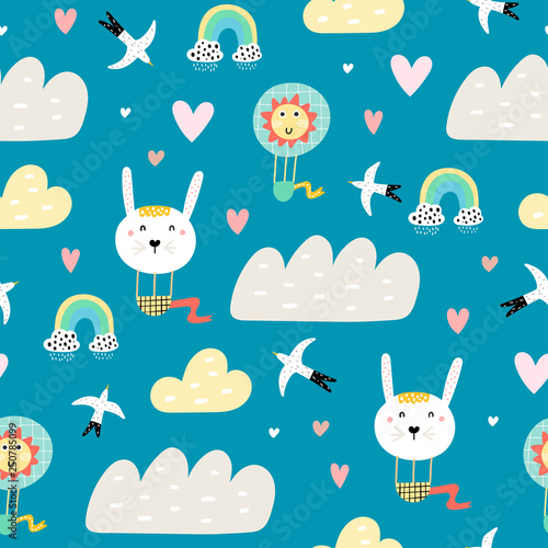 Baby seamless pattern with raining clouds, funny balloons and birds. Baby sho...