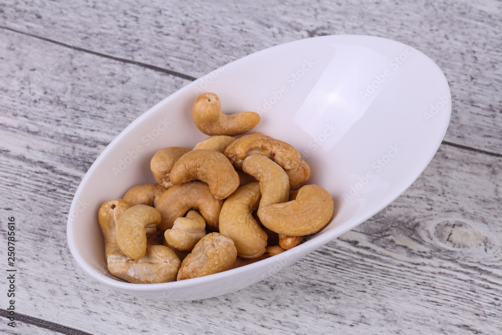 Cashew nuts heap in the bowl Cashew nuts heap in the bowl