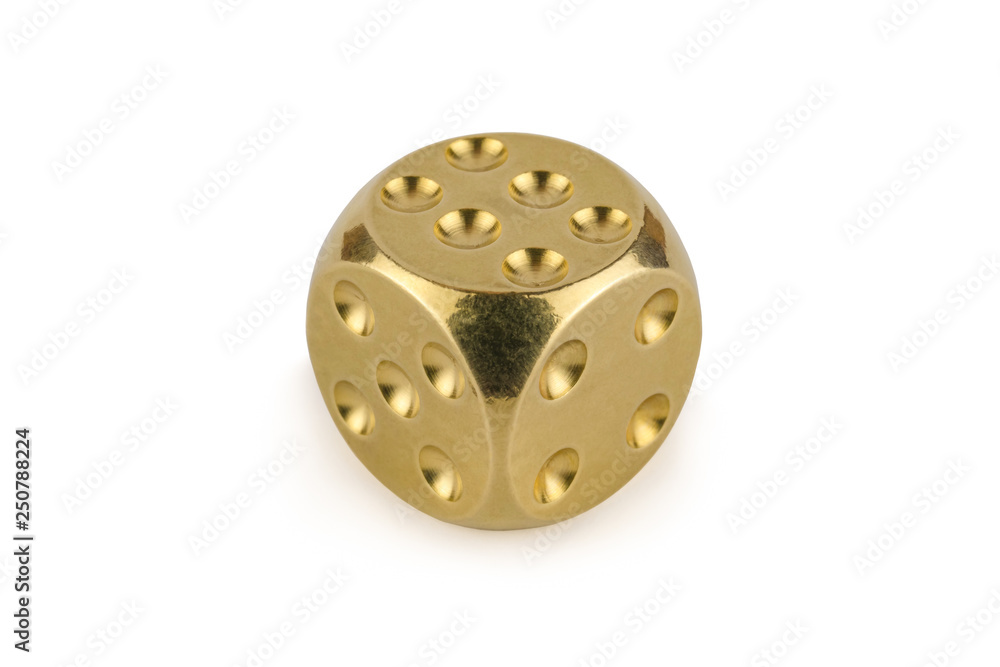 One golden dice isolated on white background. Six, with a shadow. One golden dice isolated on white background. Six, with a shadow.