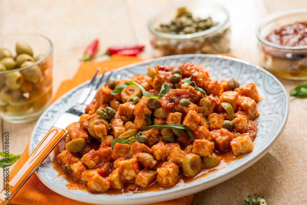 tempeh with tomatoes capers and green olives