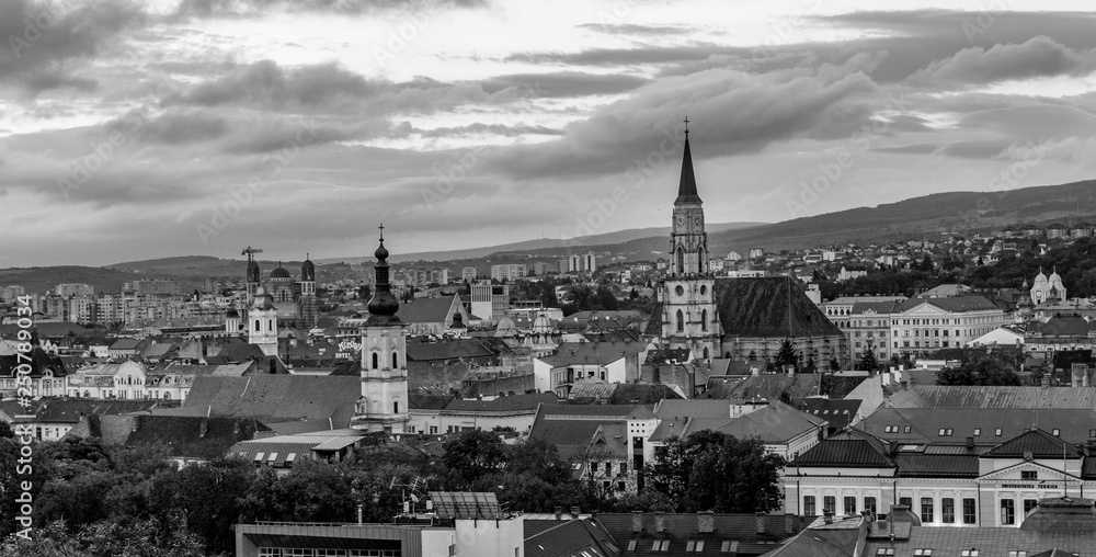 The Franciscan Church and St. Michael's Church black and white photo in Cluj-Napoca, Romania