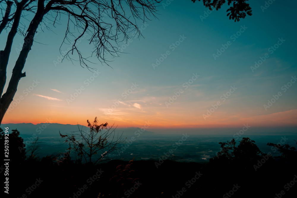 sunrise over fog and mountians