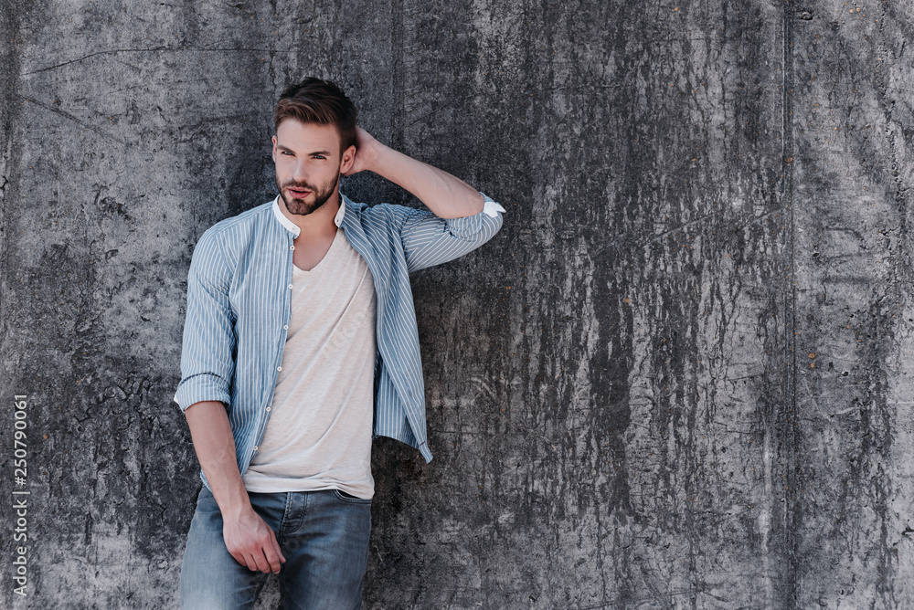 I don't see myself as extremely handsome. I just figure I can charm you into liking me. Sexy brown-haired man with blue eyes standing isolated over grey background I don't see myself as extremely handsome. I just figure I can charm you into liking me. Sexy brown-haired man with blue eyes standing isolated over grey background