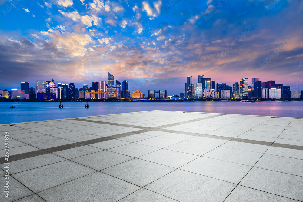 Empty square floor and beautiful city night view in Hangzhou