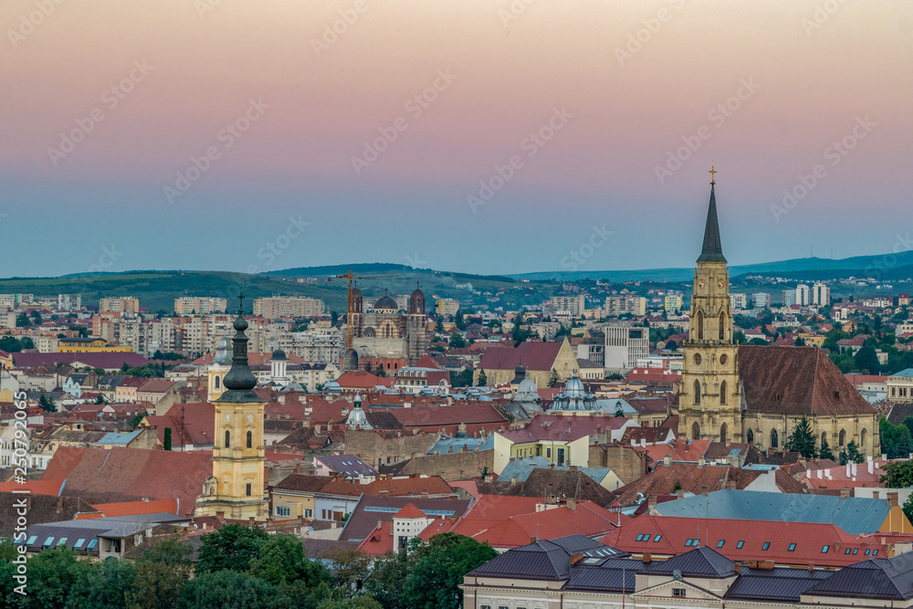 The old city of Cluj-Napoca at sunset viewed from Cetatuia Park in Cluj-Napoca, Romania