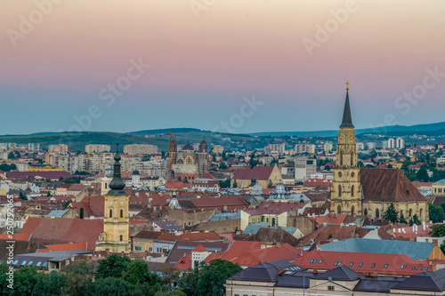 The old city of Cluj-Napoca at sunset viewed from Cetatuia Park in Cluj-Napoca, Romania