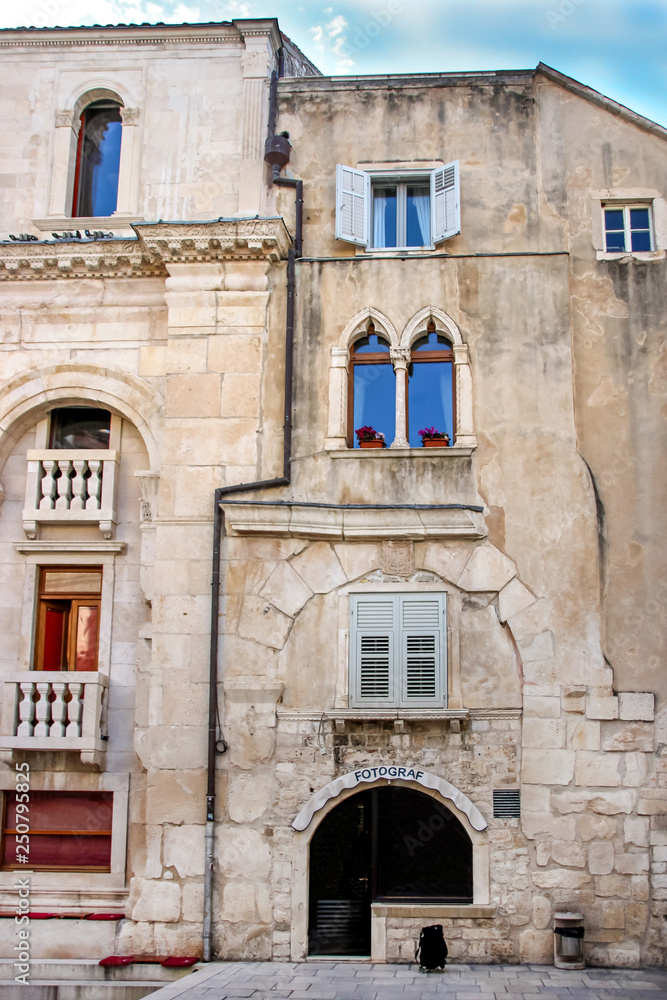ancient facade with windows in historic split, travel croatia