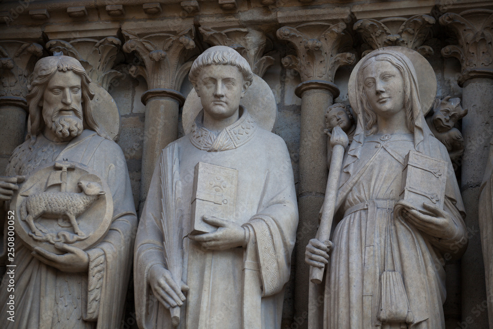 Sculpture on the entrance arch to the Church in Paris. Sculpture on the entrance arch to the Church of Notre Dame de Paris in Paris