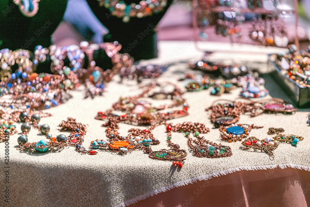 Oriental handmade earrings for sale at the market fair