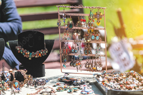 Fotografie, Tablou Oriental handmade earrings for sale at the market fair