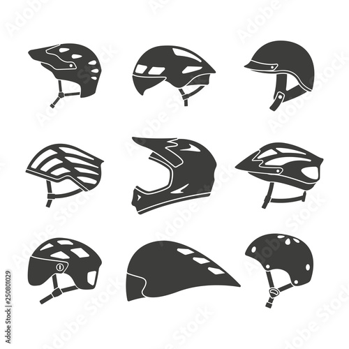 Monochrome vector illustration of a set bicycle helmets, isolated on a white background.