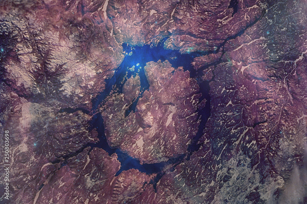 Fototapeta premium Manicouagan Impact Crater, The 50-mile diameter structure was distant past left by a massive meteorite collision . Satellite view, collage with volune effect. Elements of this image furnished by NASA.