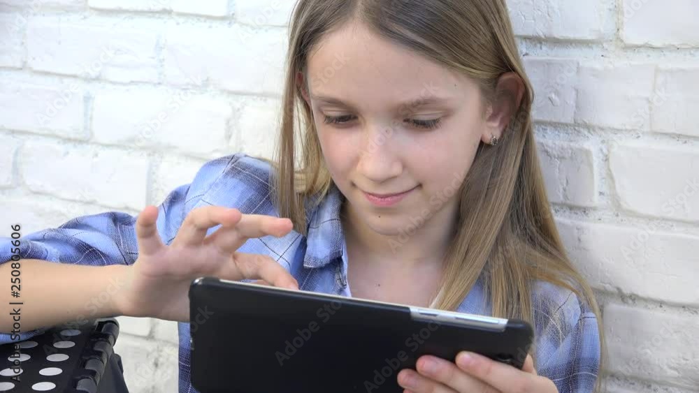 Child Playing Tablet, Kid Smartphone, Girl Reading Messages Browsing Internet Child Playing Tablet, Kid Smartphone, Girl Reading Messages Browsing Internet