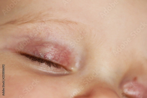 Newborn baby face closeup.