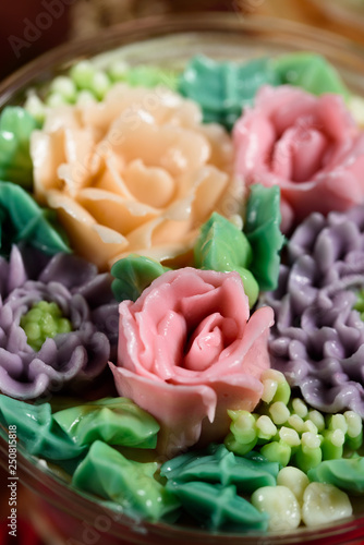Delicious, appetizing, fragrant dessert. Triple delicious light dessert, decorated with oil flowers.