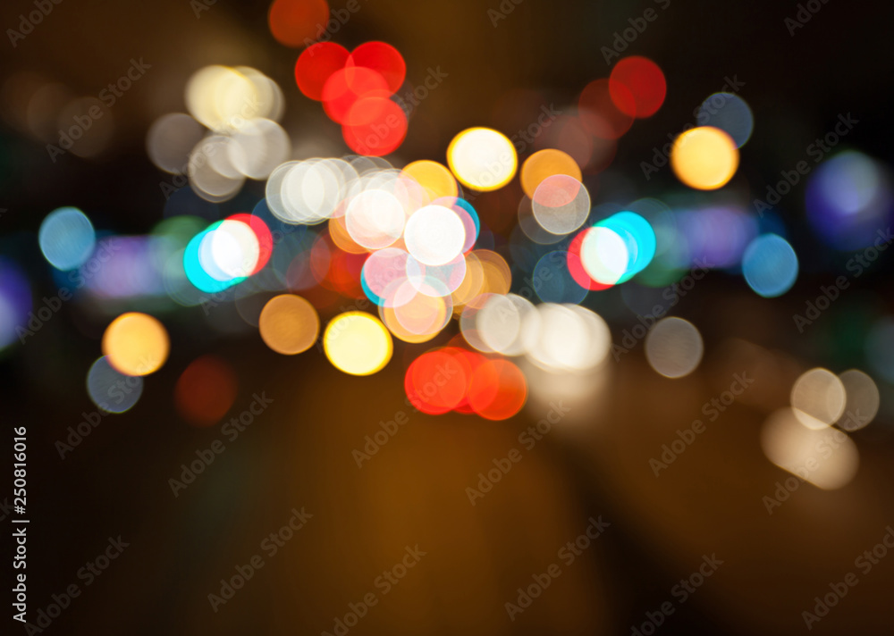 Night city street lights colorful bokeh background, darkness concept