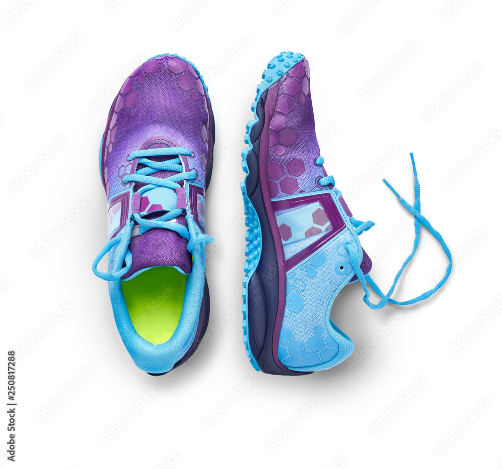 Fototapeta Top view of blue and purple trainers isolated on a white background.