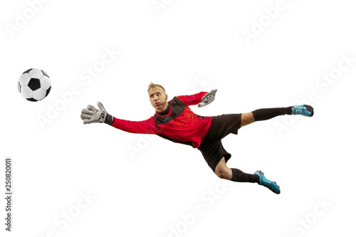 Male soccer player goalkeeper catching ball in jump. Silhouette of fit man with ball isolated on white studio background © master1305