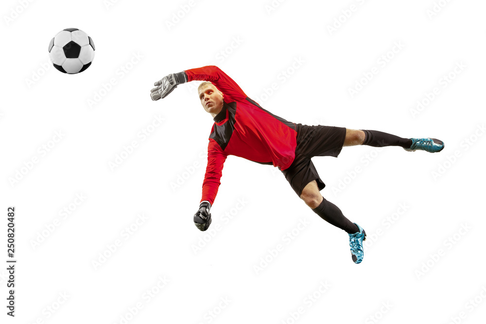 Male soccer player goalkeeper catching ball in jump. Silhouette of fit man with ball isolated on white studio background