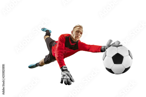 Fototapeta Naklejka Na Ścianę i Meble -  Male soccer player goalkeeper catching ball in jump. Silhouette of fit man with ball isolated on white studio background