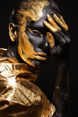 Fotobehang Zwart goud Afrikaanse vrouw zwart goud portret  © svetlanamiku