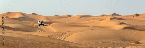 Vintage open top 4x4 SUV in the desert in Dubai  United Arab Emirates